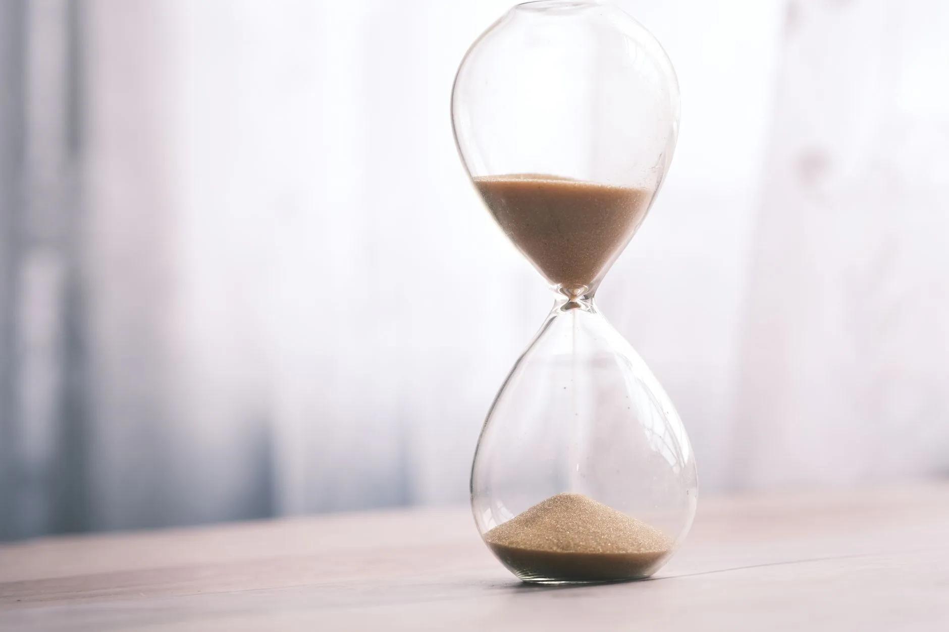 An hourglass representing timing intelligence